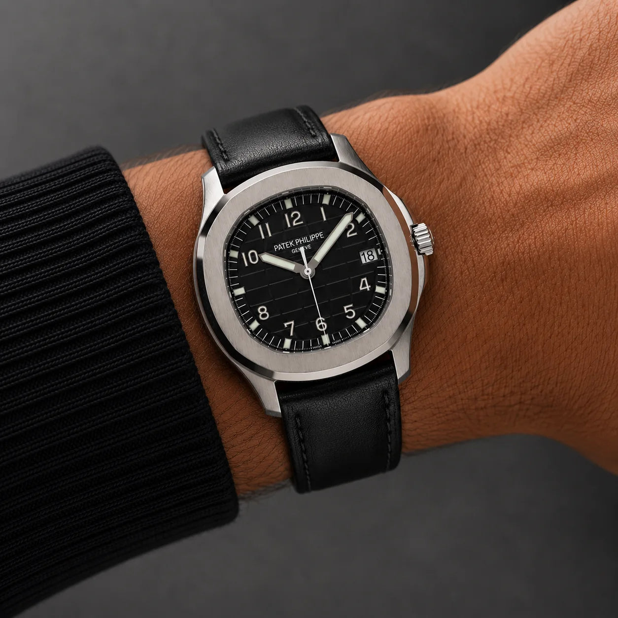 Black leather strap for Patek Philippe Nautilus worn on the wrist - Maison Brassel