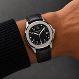 Black leather strap for Patek Philippe Nautilus worn on the wrist - Maison Brassel