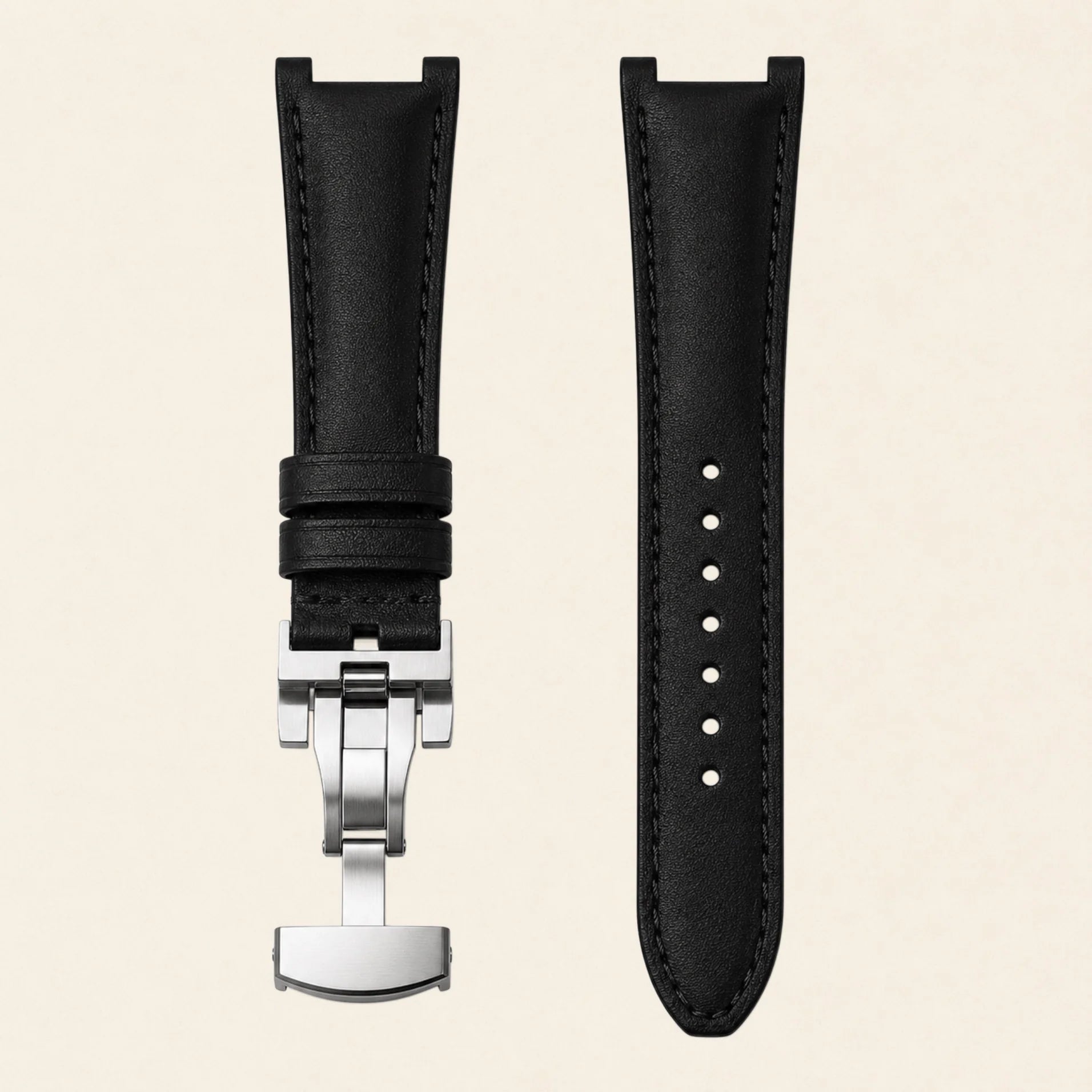 Black leather strap with integrated end-link and steel deployant clasp, for Patek Philippe Nautilus - Maison Brassel