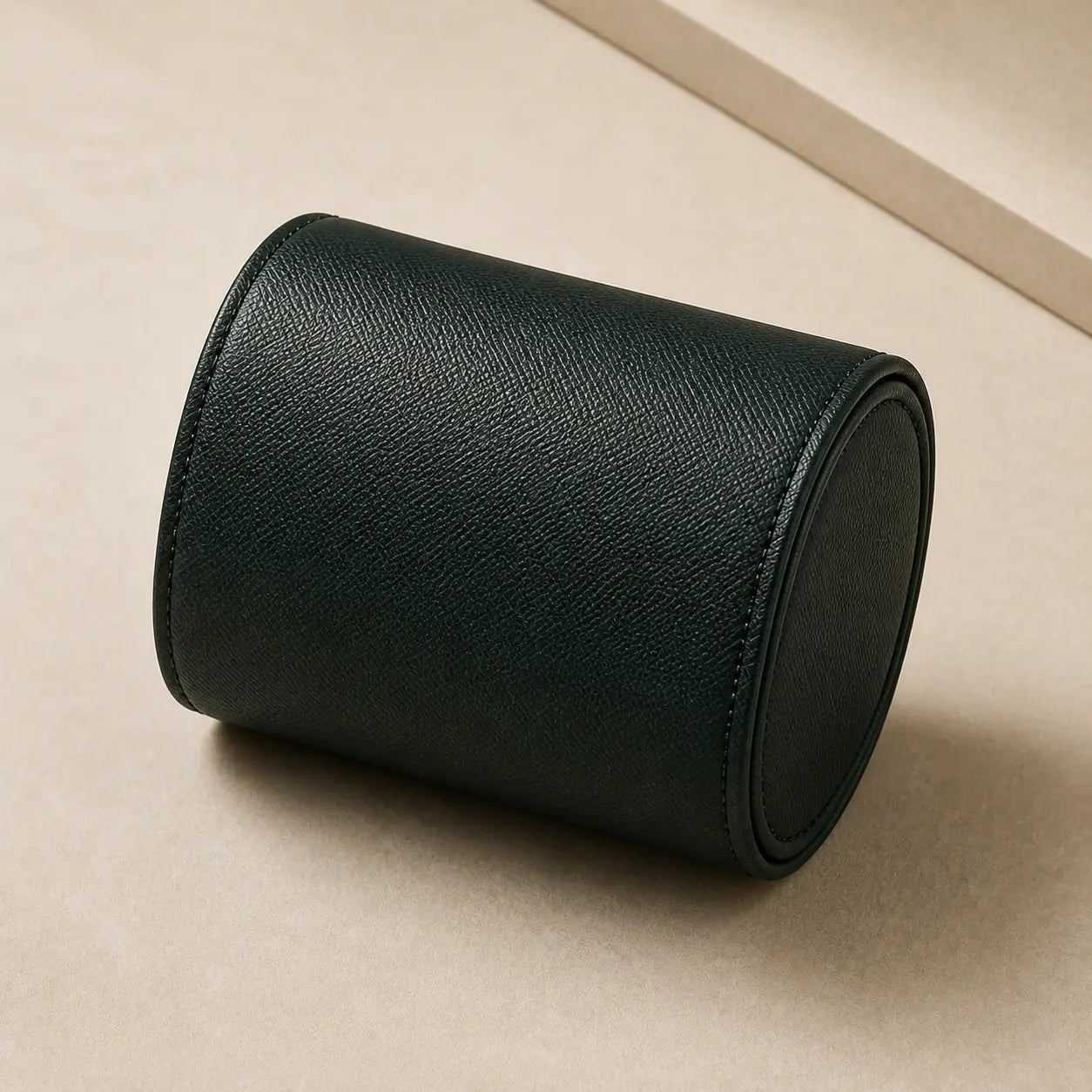 Detail of the black grained leather of the Maison Brassel single watch roll for 1 watch